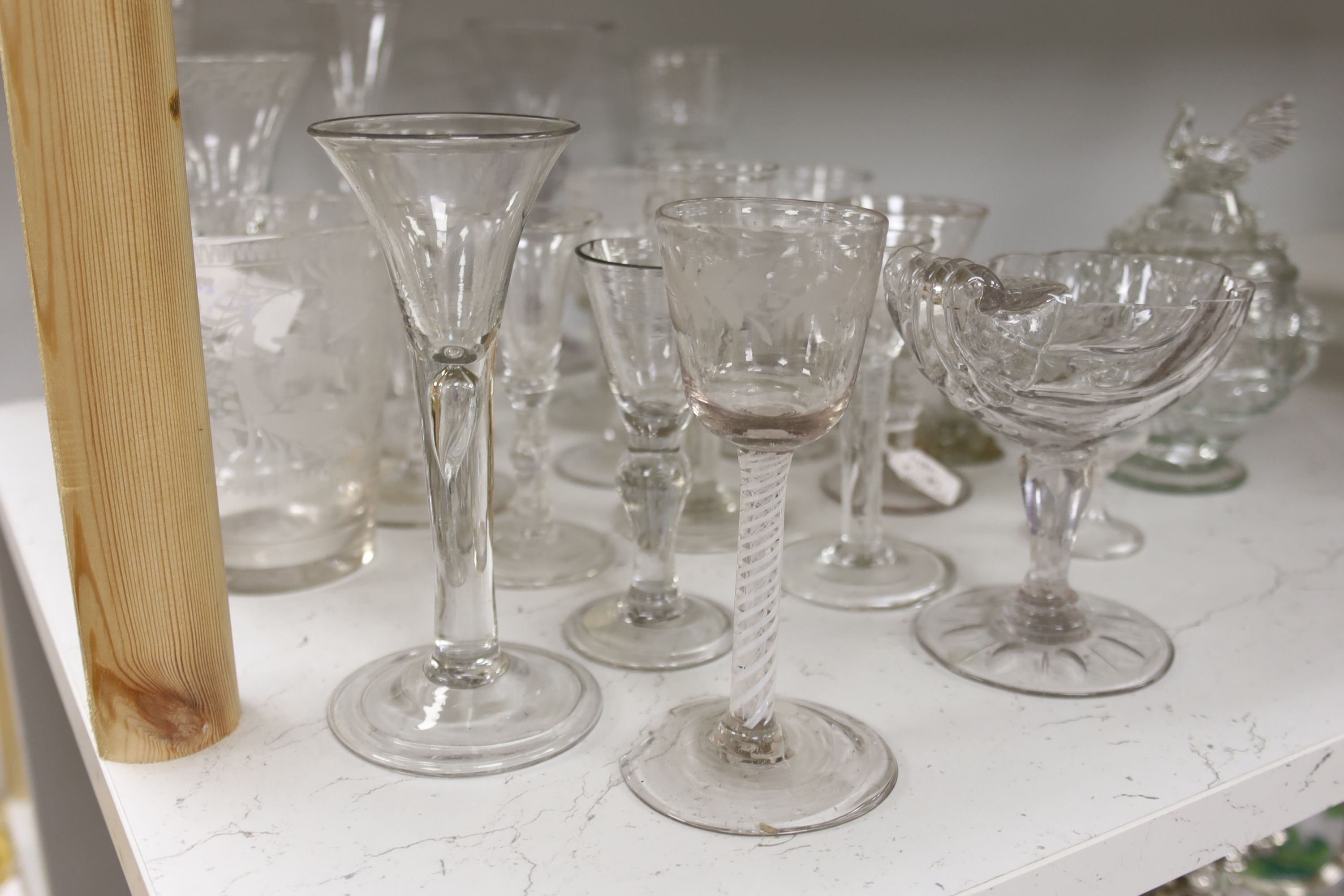 A collection of Georgian and later stem drinking glasses, ale glasses and other decorative glass wares